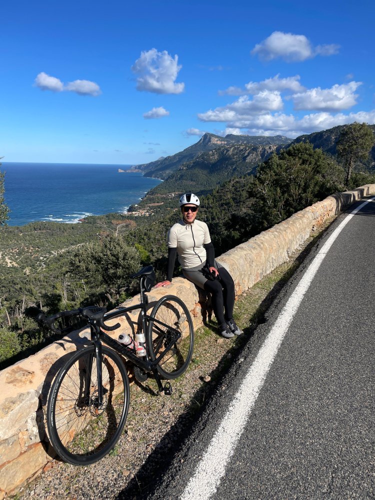 Enjoying the panoramic Mediterranean Ma-10 views with our premium rental bikes.