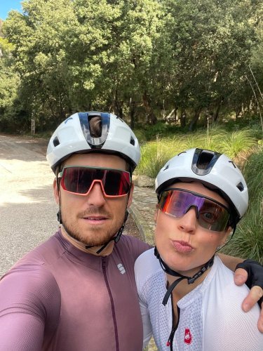 Sharing the joy of cycling through Mallorca's lush pine forests.